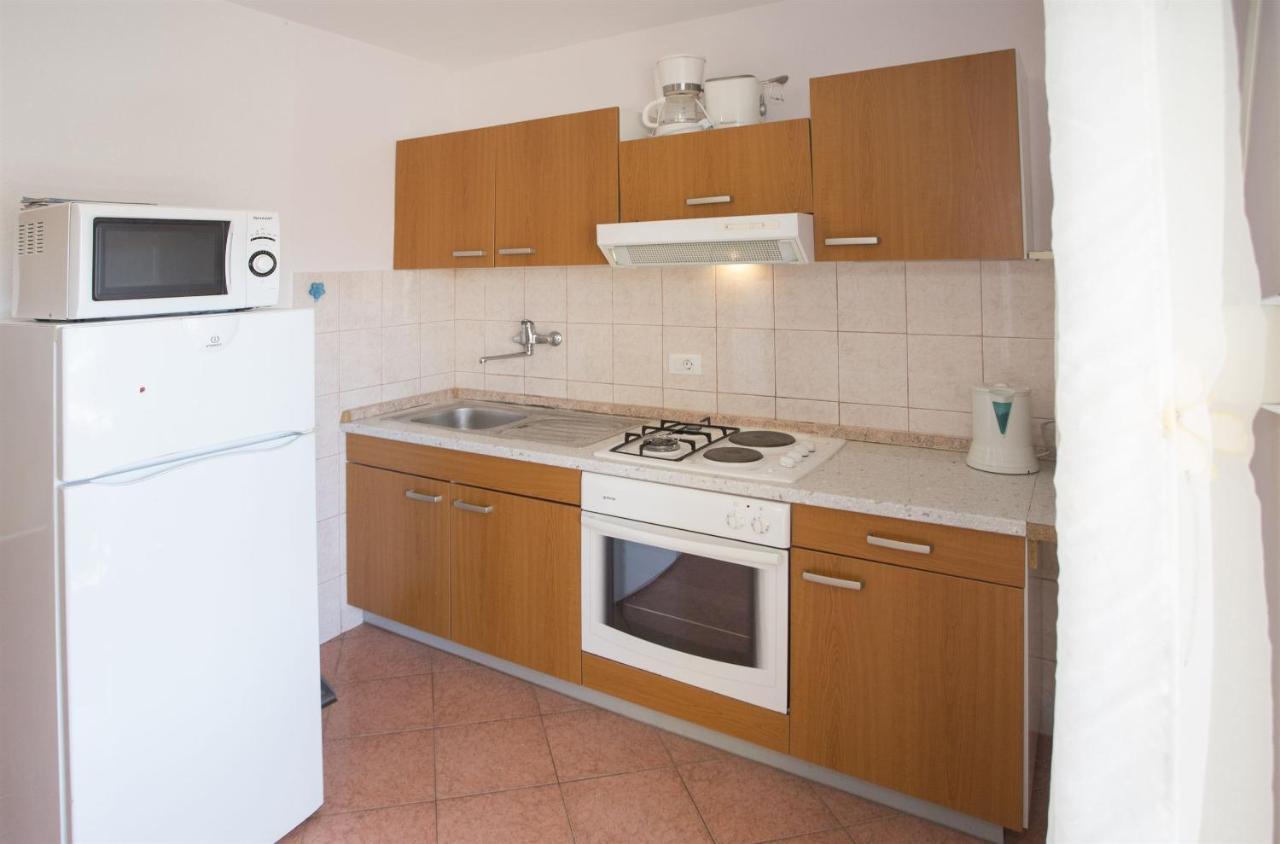 Apartments Gudelj โตรกีร์ ภายนอก รูปภาพ