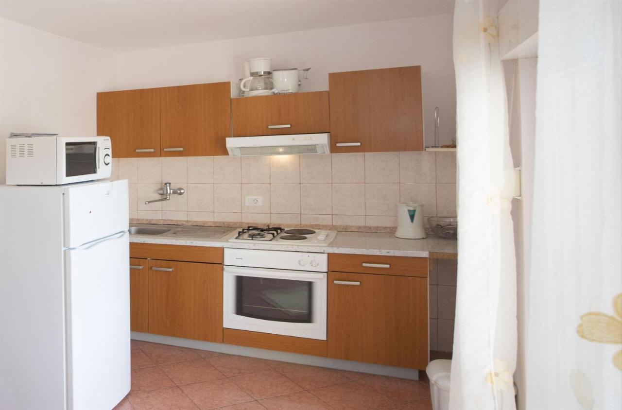 Apartments Gudelj โตรกีร์ ภายนอก รูปภาพ